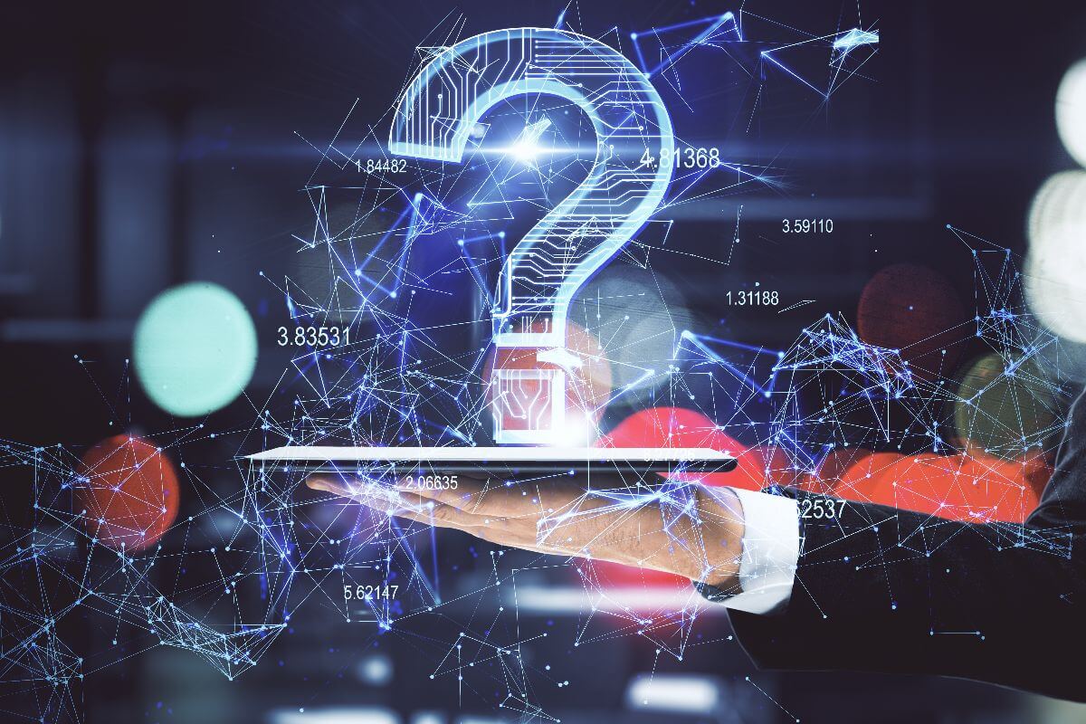 hand holding tablet with question mark