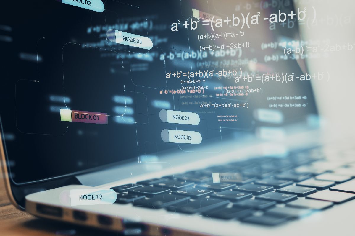 Laptop showing digital content blocks and formulas for AI-powered search structure