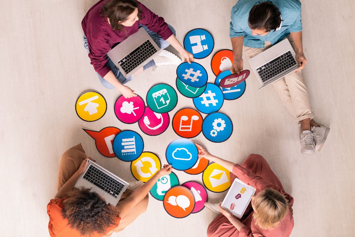 Team planning social media content with digital platform icons
Image 2: